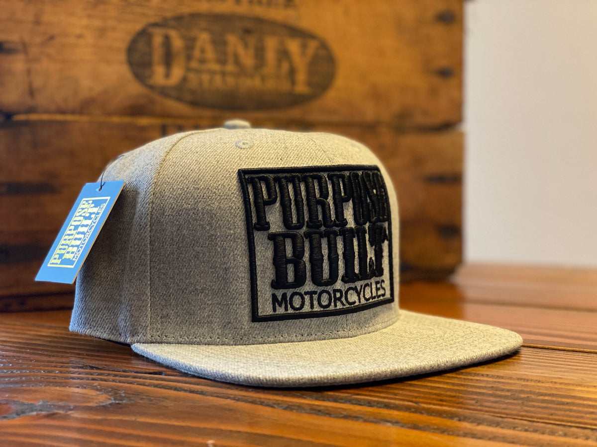 EMBROIDERED PURPOSE BUILT MOTORCYCLES SUPPORT LOGO SNAPBACK HAT - Purpose Built Motorcycles